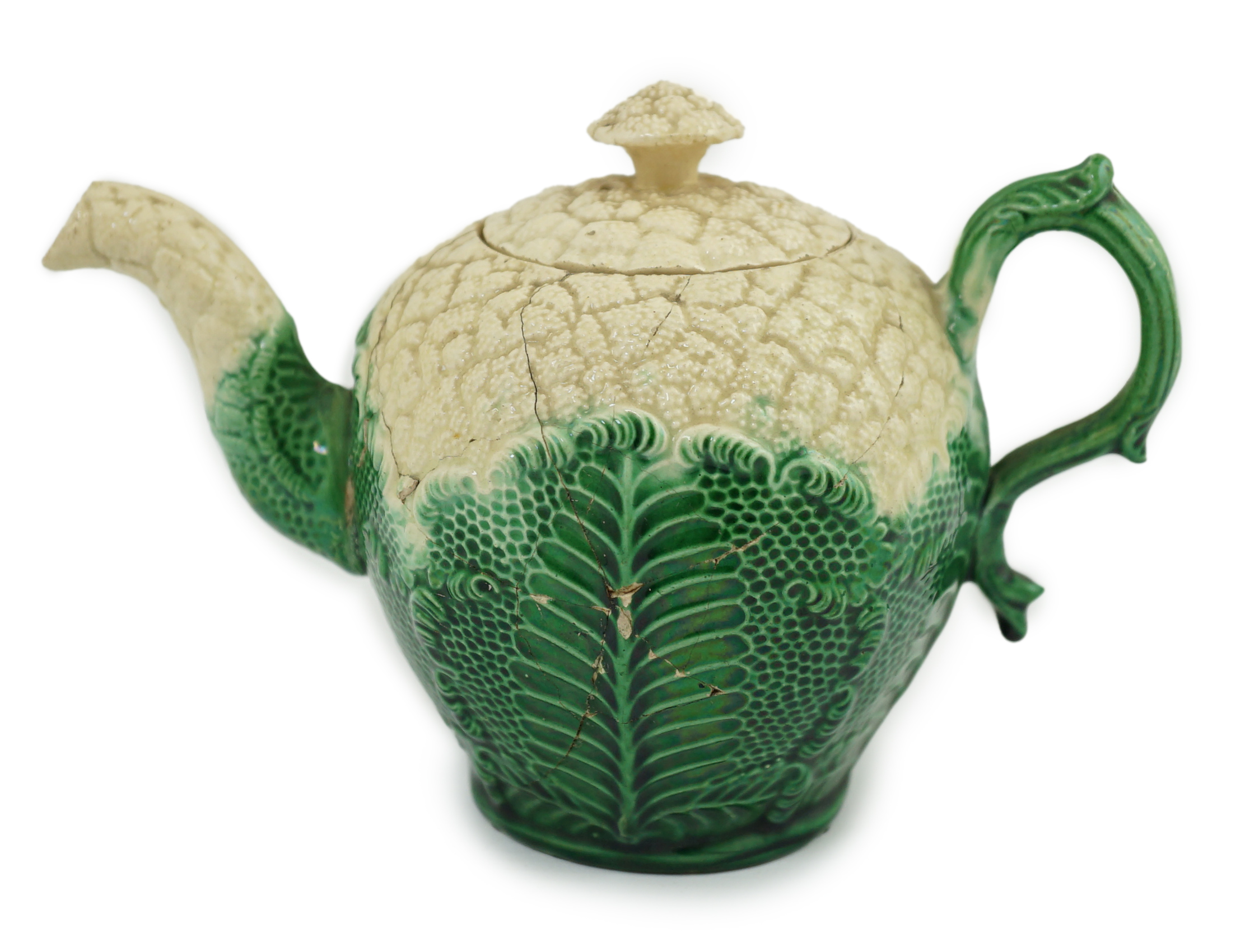 A Staffordshire cauliflower shaped creamware teapot and cover, c.1770, 10. 5 cm high. Condition - broken and repaired